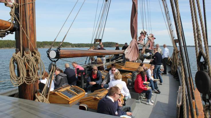 Asiakkaita Olgan kannella